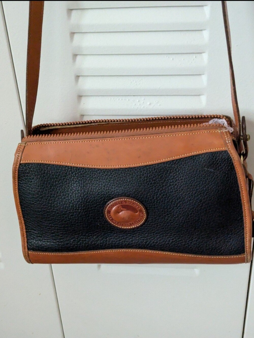 Dooney & Bourke Black and Tan Pebbled Leather Crossbody Bag